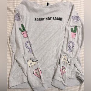 HM Divided Sorry Not Sorry sweatshirt